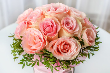 Beautiful Wedding bouquet of pink roses close up. The concept of marriage and love.