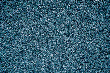 Abstract background of granite chips. Photo wall of the facade of the building.