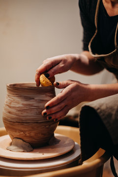 Potter Making Pots in Studio