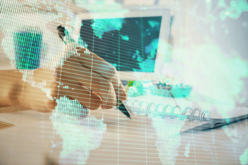 International business hud over woman's hands writing background. Concept of hard work. Double...