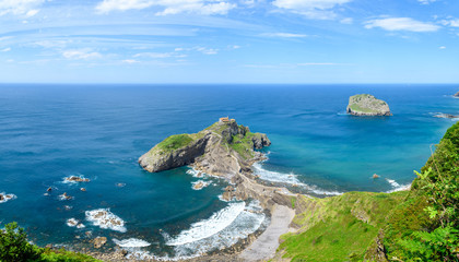 sunny day at gaztelugatxe island, located at basque country coastline