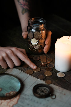 person counting te money saved for the next travel destination