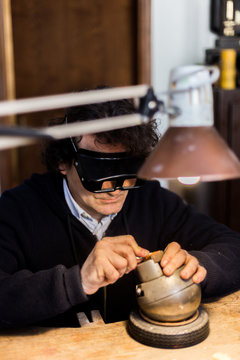 Man making handmade rubber stamp