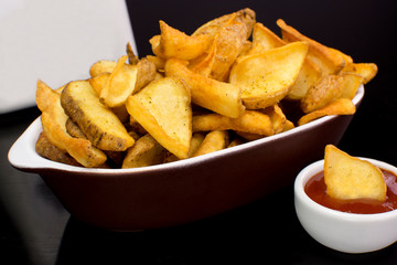 Rustic french fries in a pub table