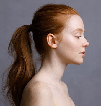 young woman with red hair