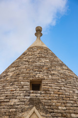 Fototapeta na wymiar Roof of traditional Apulian trullo in Alborobello, southern Italy