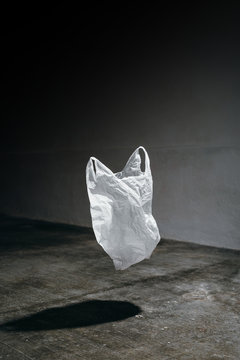 Plastic bag falling on floor