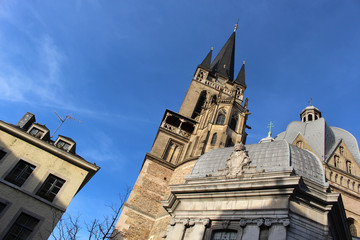 The Domes, the side view from the bottom and the details of Aachen Cathedral. Facade of...