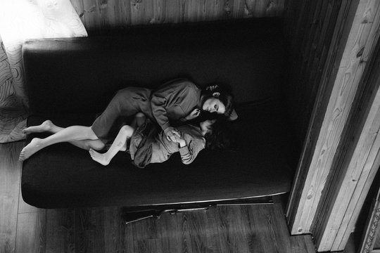 Little girl and mother are resting inside