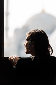 Woman looking at mosque