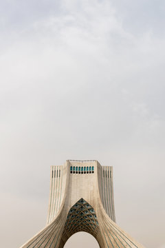 Modern tower and cloudy sky