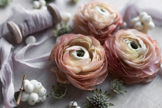 Up Close Image Of Pink Ranunculus, Ribbon and Other Flowers