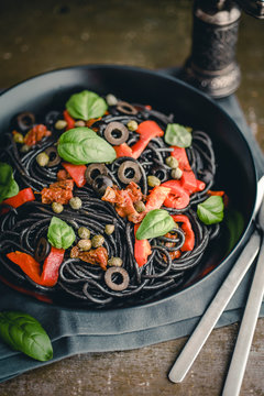 Food: Spaghetti sepia with dried tomato, grilled bell pepper