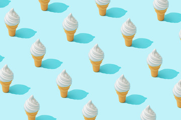 Trendy sunlight Summer pattern made with vannila ice cream on bright light blue background. Minimal...