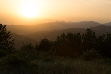 Beautiful landscape in the mountains with the sun at dawn. Mountains at the sunset time. Azerbaijan Caucasus Mountains. Agsu pass. Baskal. Nature