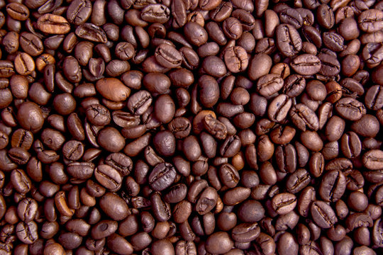 Roasted Coffee Beans background, Brown coffee beans for can be used as a background © Achira22
