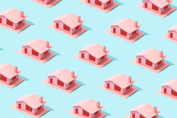 Trendy sunlight Summer pattern made with pink paper house on bright light blue background. Minimal...