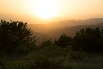 Beautiful landscape in the mountains with the sun at dawn. Mountains at the sunset time. Azerbaijan Caucasus Mountains. Agsu pass. Baskal. Nature