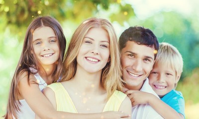 Happy cheerful family on background