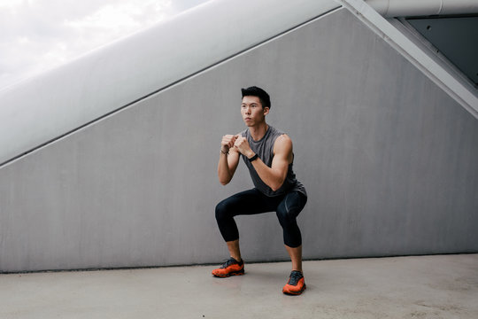 Asian Man Warming Up