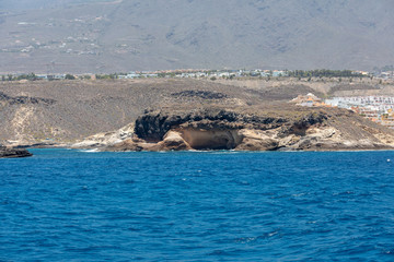 Fototapeta premium Beautiful rocks at beach with waves and blue water in Teneriffa
