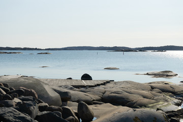 The blue ocean meeting the cliffs
