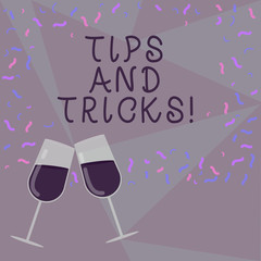 Fototapeta premium Text sign showing Tips And Tricks. Conceptual photo Steps Life hacks Handy advice Recommendations Skills Filled Wine Glass Toasting for Celebration with Scattered Confetti photo