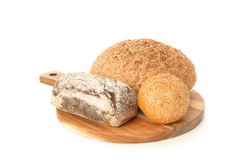 Bakery products on cutting board isolated on white background