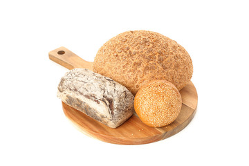Bakery products on cutting board isolated on white background
