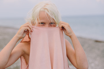 Little child on the prebble beach