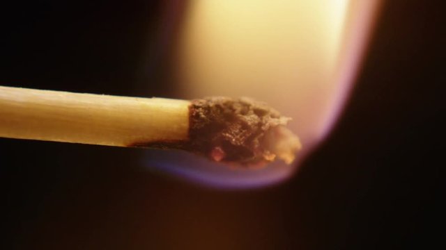 Match lighting up in slow motion