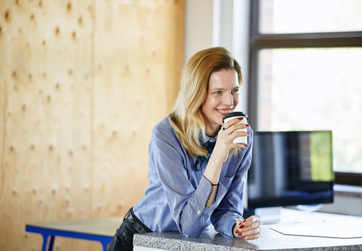 Taking a coffee break in a modern office.