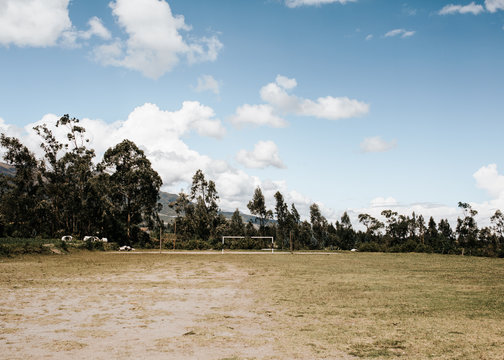 Open soccer field looking towards mountain