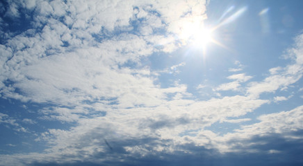 the sun hid behind beautiful colorful clouds