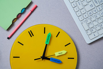 Time management deadline and schedule concept: clock, notebook and keyboard on grey background. Flat lay