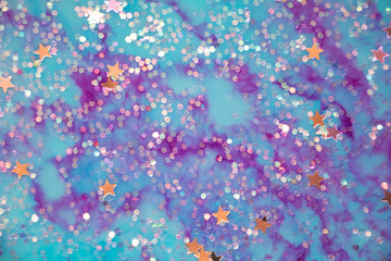 Fototapeta premium Unicorn Dreams Background Texture. Beautiful swirls of purple and tuquoise. Stars and sparkles. Dreams and wishes. All the happy things. Lose yourself inside the fantasy.