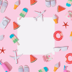 Creative composition made with various travel objects on pastel pink background. Summer vacation pattern.