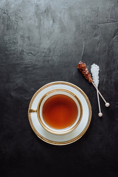 Vintage tea cup and sugar sticks