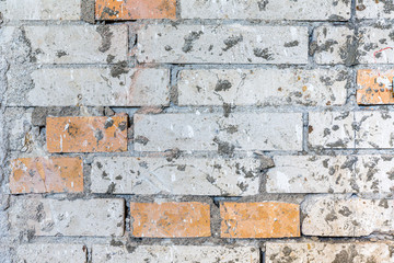 Mauer mit abgeschlagenem Putz