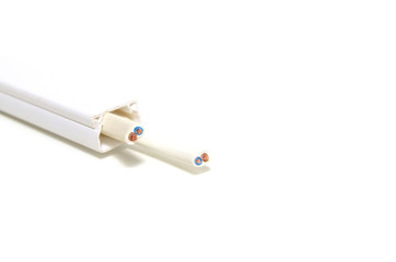 Cable duct with wires running through it on a white background.