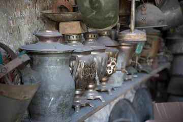 Coppersmith workshop and hand made copper things, Lahich, Azerbaijan. Interior of coppersmith workshop in the village.