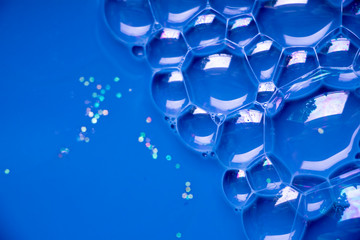 Blue Bubble Cells Background Texture.  Hive like pattern with a deep blue background. Interesting texture full of hexagons.