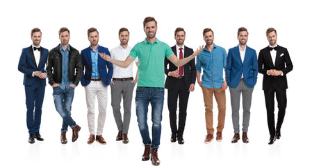 Obraz premium Positive man stepping in front of a team of himselfs