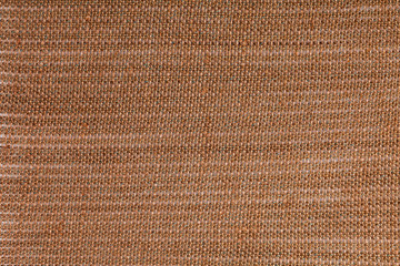 Fototapeta na wymiar Dark brawn fabric background texture. Detail of textile material close-up