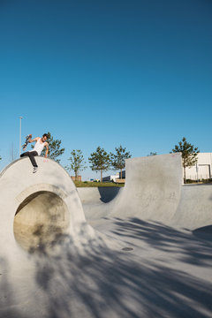 Skateboarder climbing