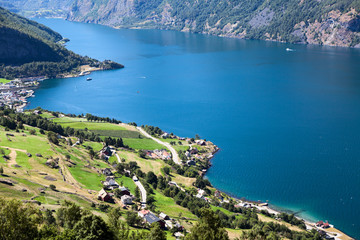 Fototapeta na wymiar Aurlandsfjord long fjord in Sogn og Fjordane county with village Aurlandsvangen. Norway. Seen from Stegastein, route E16