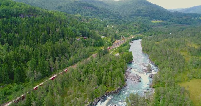 AERIAL. Train Oslo - Bergen in mountains. Norway.