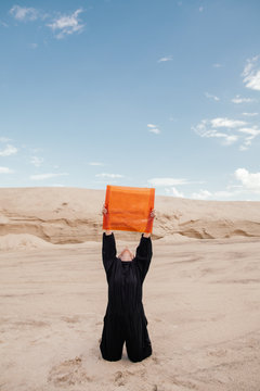 Young model posing with orange filter