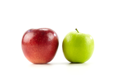 two apples green and red on white background