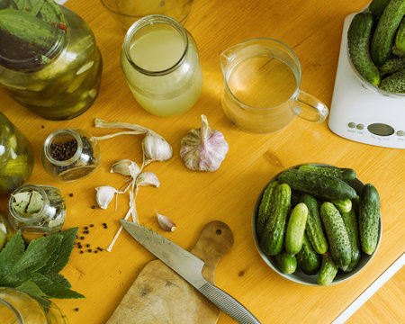 A plate of cucumbers and ingredients for marinade